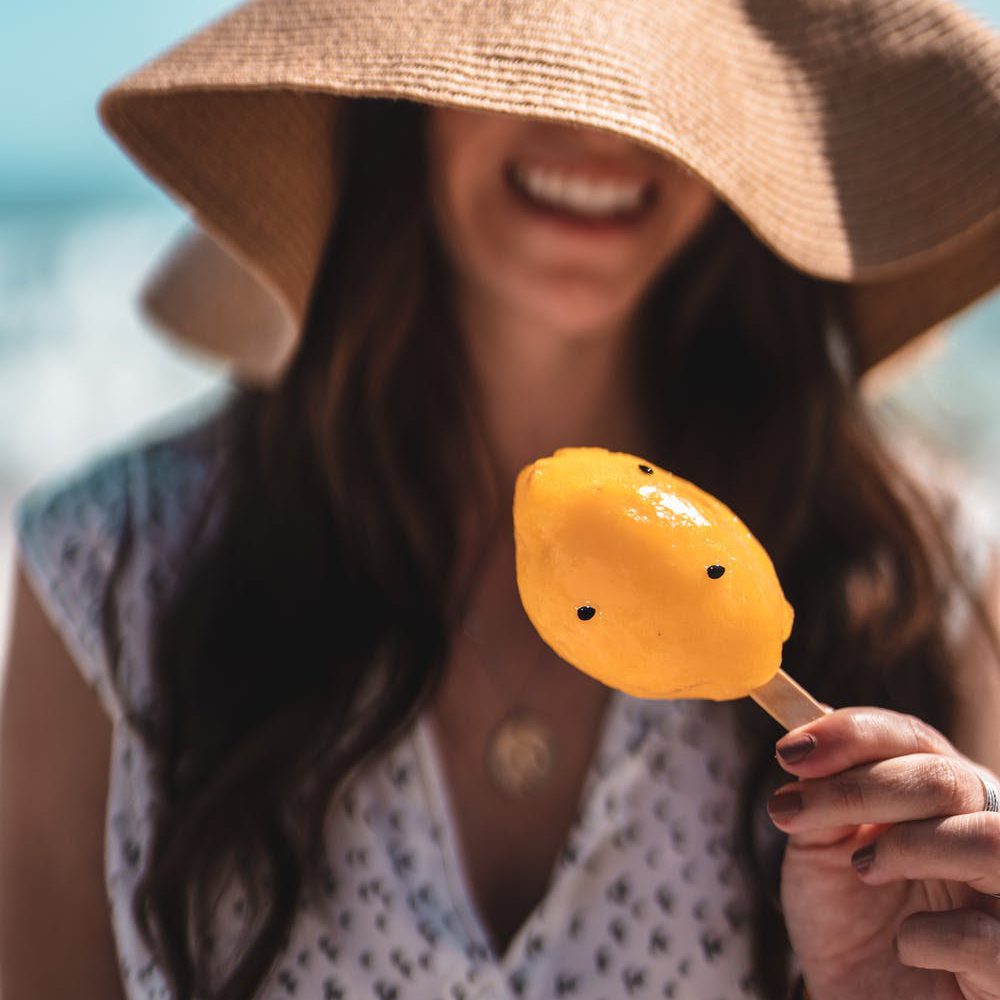 Woman holding a Hana Popsicle